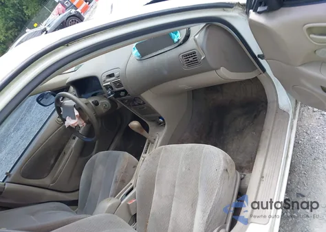 1999 Toyota Corolla Ce from USA, damaged, VIN 2T1BR12E5XC183053